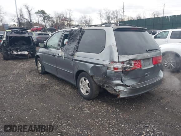 ✅ 2001 Honda Odyssey EX • VIN: 2HKRL18661H618490 • Lot: 43773737. Listed on IAAI with 141,985 mi. Free auction sales archive from the USA and detailed vehicle history report at DreamBid. Image 3.