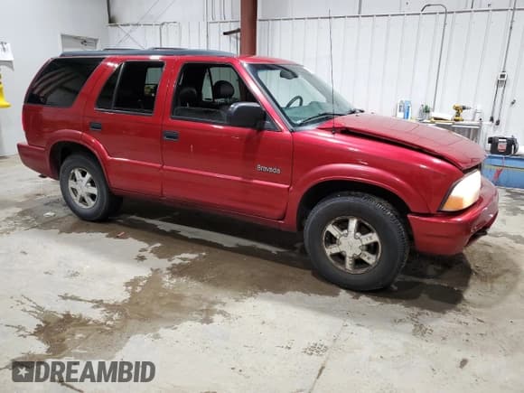 ✅ 2000 Oldsmobile Bravada • VIN: 1GHDT13W6Y2404218 • Лот: 49784485. Опубликован ранее на Copart с пробегом 128 841 миль. Бесплатный доступ к архиву аукционных продаж из США и подробный отчёт об истории автомобиля на DreamBid. Изображение 4.