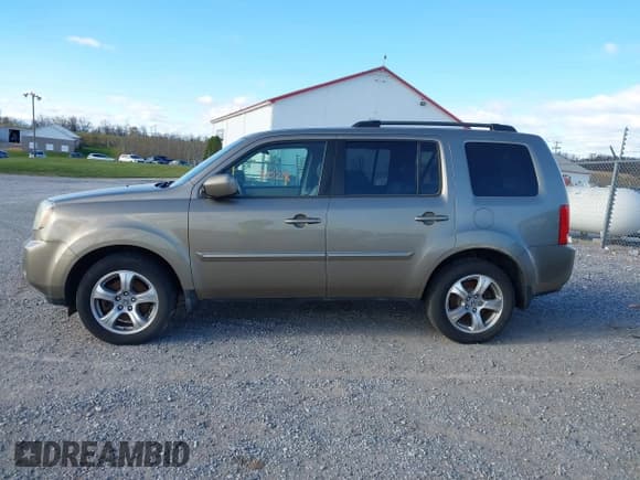 ✅ 2011 Honda Pilot EX-L • VIN: 5FNYF4H61BB050394 • Lot: 43728028. Wystawiony na IAAI z przebiegiem 185 389 mil. Bezpłatny archiwum sprzedaży aukcyjnych z USA i szczegółowy raport historii pojazdu na DreamBid. Zdjęcie 14.