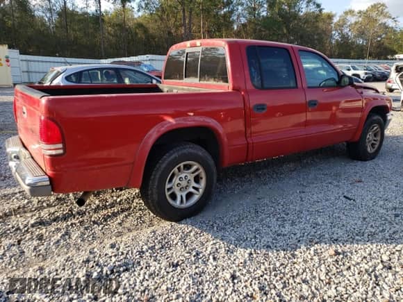 2004 Dodge Dakota SLT z VIN 1D7HL48K04S781707, wystawiony jako Copart lot #74326284 z przebiegiem 190 531 mil mil oraz Czysty tytuł • Clean title. Historia ofert i sprzedaży dostępna na DreamBid. Obrazek 3.