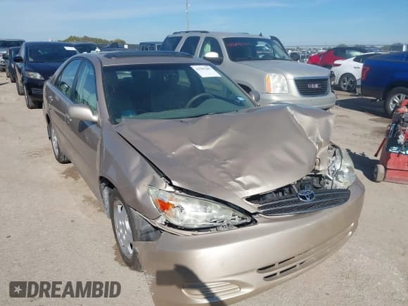 ✅ 2002 Toyota Camry LE • VIN: 4T1BF32K62U020509 • Lot: 43587007. Listed on IAAI with 91,828 mi. Free auction sales archive from the USA and detailed vehicle history report at DreamBid. Image 6.
