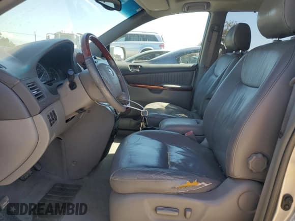✅ 2004 Toyota Sienna XLE • VIN: 5TDZA22C94S197132 • Lot: 71495105. Listed on Copart with 271,885 mi. Free auction sales archive from the USA and detailed vehicle history report at DreamBid. Image 7.