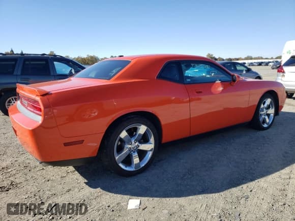 ✅ 2009 Dodge Challenger R/T • VIN: 2B3LJ54T59H511144 • Lot: 79312184. Wystawiony na Copart z przebiegiem 75 467 mil. Bezpłatny archiwum sprzedaży aukcyjnych z USA i szczegółowy raport historii pojazdu na DreamBid. Zdjęcie 3.