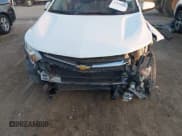 ✅ 2020 Chevrolet Equinox LT • VIN: 2GNAXJEV0L6164006 • Lot: 43519260. Listed on IAAI with 60,174 mi. Free auction sales archive from the USA and detailed vehicle history report at DreamBid. Image 17.