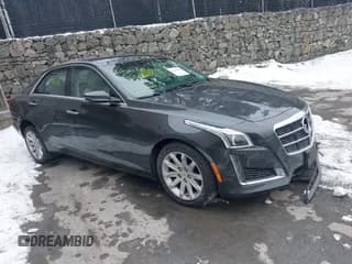 ✅ 2014 Cadillac CTS AWD • VIN: 1G6AW5SX5E0140985 • Lot: 41544710. Listed on IAAI with 131,176 mi. Free auction sales archive from the USA and detailed vehicle history report at DreamBid. Image 1.
