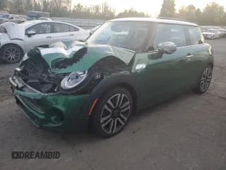 ✅ 2021 MINI Hardtop Cooper S • VIN: WMWXR5C02M2M91336 • Lot: 79965794. Listed on Copart with 24,548 mi. Free auction sales archive from the USA and detailed vehicle history report at DreamBid. Image 1.