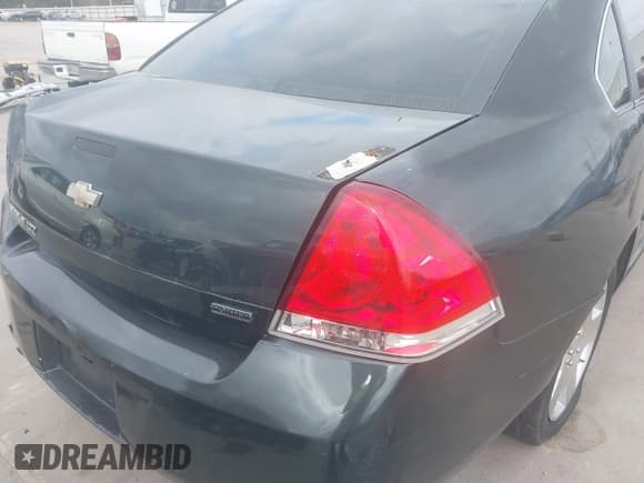 ✅ 2014 Chevrolet Impala LTZ • VIN: 2G1WC5E3XE1189956 • Lot: 43718567. Listed on IAAI with 142,559 mi. Free auction sales archive from the USA and detailed vehicle history report at DreamBid. Image 18.