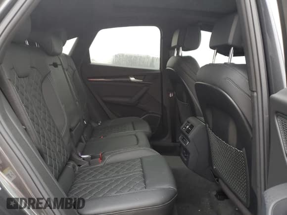 ✅ 2023 Audi SQ5 Sportback Premium Plus • VIN: WA124AFY0P2185529 • Лот: 85858434. Опубликован ранее на Copart с пробегом 14 976 миль. Бесплатный доступ к архиву аукционных продаж из США и подробный отчёт об истории автомобиля на DreamBid. Изображение 11.