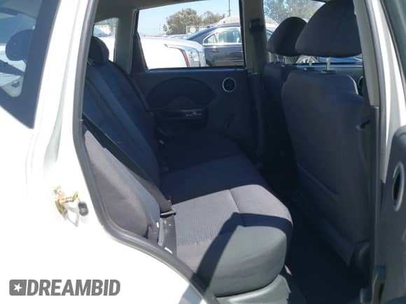 2007 Chevrolet Aveo LS with VIN KL1TD66697B732035, listed as a IAAI auction lot 42528247 with 155,438 mi miles and . Bid and sale history available at DreamBid. Image 8.