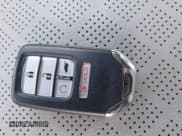 ✅ 2021 Honda Passport EX-L • VIN: 5FNYF8H56MB012533 • Lot: 42561010. Listed on IAAI with 40,568 mi. Free auction sales archive from the USA and detailed vehicle history report at DreamBid. Image 11.