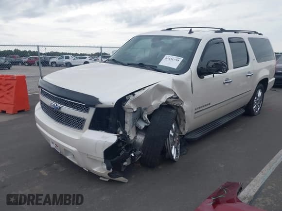 ✅ 2010 Chevrolet Suburban LTZ • VIN: 1GNUKKE35AR165749 • Lot: 43431739. Listed on IAAI with 221,583 mi. Free auction sales archive from the USA and detailed vehicle history report at DreamBid. Image 2.