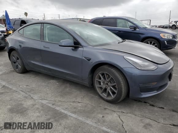 ✅ 2022 Tesla Model 3 • VIN: 5YJ3E1EA0NF375126 • Lot: 53294925. Listed on Copart with 28,318 mi. Free auction sales archive from the USA and detailed vehicle history report at DreamBid. Image 4.