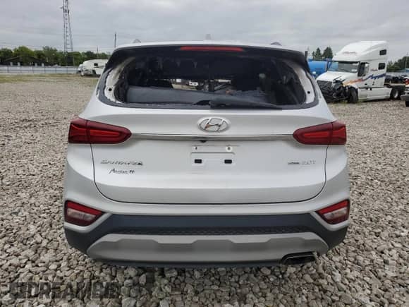 2019 Hyundai Santa Fe Limited z VIN 5NMS5CAA4KH099511, wystawiony jako Copart lot #69178255 z przebiegiem Nie podano mil oraz Nie do naprawy • Non repairable. Historia ofert i sprzedaży dostępna na DreamBid. Obrazek 6.