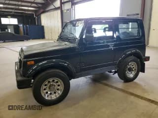 ✅ 1995 Suzuki Samurai • VIN: JB31W111218 • Lot: 58017555. Wystawiony na Copart z przebiegiem 184 869 mil. Bezpłatny archiwum sprzedaży aukcyjnych z USA i szczegółowy raport historii pojazdu na DreamBid. Zdjęcie 4.