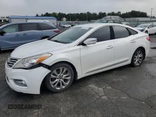 ✅ 2013 Hyundai Azera • VIN: KMHFG4JG8DA228669 • Лот: 62734185. Опубликован ранее на Copart с пробегом 148 611 миль. Бесплатный доступ к архиву аукционных продаж из США и подробный отчёт об истории автомобиля на DreamBid. Изображение 1.