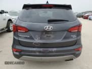 ✅ 2017 Hyundai Santa Fe 2.4L • VIN: 5XYZUDLB3HG390372 • Лот: 81646963. Опубликован ранее на Copart с пробегом 92 798 миль. Бесплатный доступ к архиву аукционных продаж из США и подробный отчёт об истории автомобиля на DreamBid. Изображение 6.