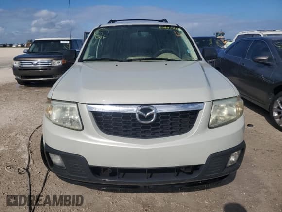 ✅ 2009 Mazda Tribute Sport • VIN: 4F2CZ027X9KM01666 • Лот: 80902224. Опубликован ранее на Copart с пробегом Не указан. Бесплатный доступ к архиву аукционных продаж из США и подробный отчёт об истории автомобиля на DreamBid. Изображение 5.