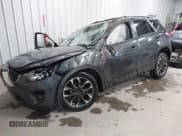 ✅ 2016 Mazda CX-5 Grand Touring • VIN: JM3KE4DY4G0679077 • Lot: 43560857. Wystawiony na IAAI z przebiegiem 83 348 mil. Bezpłatny archiwum sprzedaży aukcyjnych z USA i szczegółowy raport historii pojazdu na DreamBid. Zdjęcie 2.