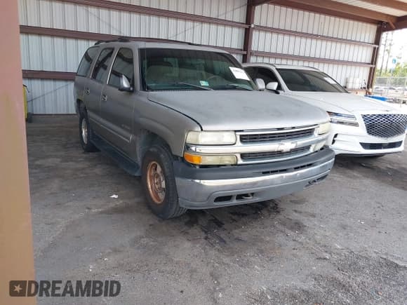 ✅ 2001 Chevrolet Tahoe LS • VIN: 1GNEK13T71J206740 • Lot: 42883272. Wystawiony na IAAI z przebiegiem 232 580 mil. Bezpłatny archiwum sprzedaży aukcyjnych z USA i szczegółowy raport historii pojazdu na DreamBid. Zdjęcie 1.