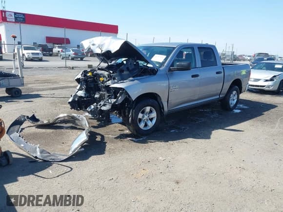 ✅ 2022 Ram 1500 SLT • VIN: 1C6RR6LG7NS203494 • Lot: 41777251. Wystawiony na IAAI z przebiegiem 61 375 mil. Bezpłatny archiwum sprzedaży aukcyjnych z USA i szczegółowy raport historii pojazdu na DreamBid. Zdjęcie 2.