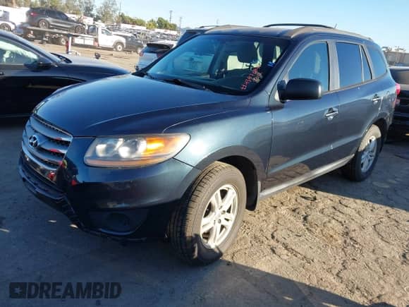 2012 Hyundai Santa Fe GLS z VIN 5XYZGDAB0CG096351, wystawiony jako IAAI lot #43476849 z przebiegiem 96 793 mil mil oraz . Historia ofert i sprzedaży dostępna na DreamBid. Obrazek 2.