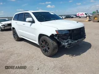 ✅ 2015 Jeep Grand Cherokee SRT • VIN: 1C4RJFDJ4FC182206 • Lot: 42431139. Wystawiony na IAAI z przebiegiem 99 498 mil. Bezpłatny archiwum sprzedaży aukcyjnych z USA i szczegółowy raport historii pojazdu na DreamBid. Zdjęcie 1.
