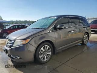 ✅ 2014 Honda Odyssey Touring • VIN: 5FNRL5H95EB004231 • Lot: 83753995. Wystawiony na Copart z przebiegiem 206 372 mil. Bezpłatny archiwum sprzedaży aukcyjnych z USA i szczegółowy raport historii pojazdu na DreamBid. Zdjęcie 1.