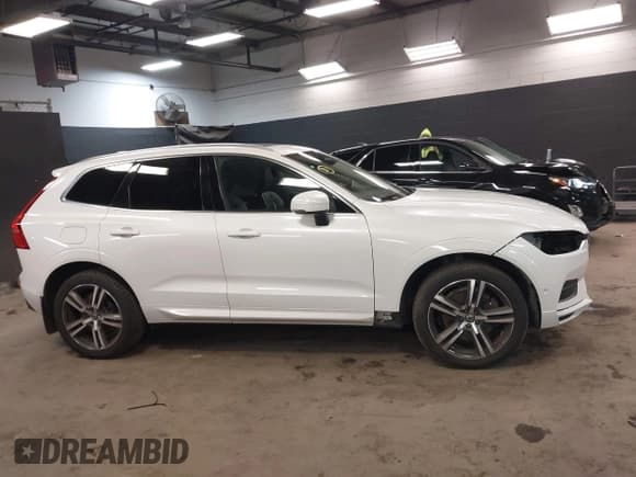 ✅ 2019 Volvo XC60 Momentum • VIN: LYVA22RK2KB230191 • Lot: 41248426. Listed on IAAI with 80,347 mi. Free auction sales archive from the USA and detailed vehicle history report at DreamBid. Image 13.