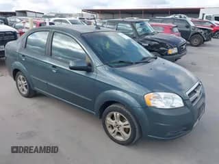 2011 Chevrolet Aveo 1LT z VIN KL1TD5DE9BB140499, wystawiony jako IAAI lot #43278303 z przebiegiem 66 525 mil mil oraz . Historia ofert i sprzedaży dostępna na DreamBid. Obrazek 1.