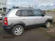 2005 Hyundai Tucson z VIN KM8JM12D95U105582, wystawiony jako Copart lot #73337864 z przebiegiem 138 898 mil mil oraz Czysty tytuł • Clean title. Historia ofert i sprzedaży dostępna na DreamBid. Obrazek 3.