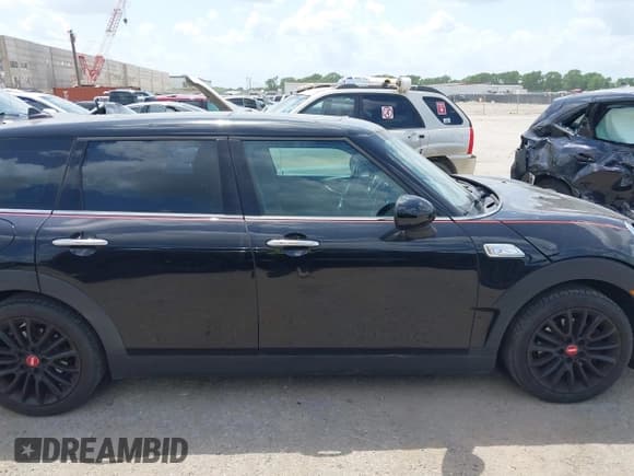 ✅ 2017 MINI Clubman Cooper S • VIN: WMWLN9C50H2E48877 • Lot: 42528606. Wystawiony na IAAI z przebiegiem 83 265 mil. Bezpłatny archiwum sprzedaży aukcyjnych z USA i szczegółowy raport historii pojazdu na DreamBid. Zdjęcie 13.