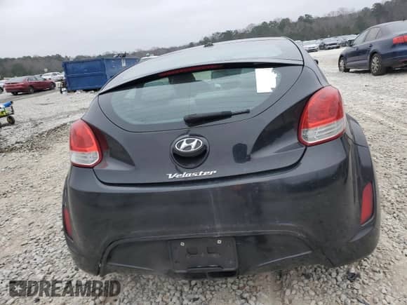 2012 Hyundai Veloster w/Red Int z VIN KMHTC6AD2CU058130, wystawiony jako Copart lot #86747414 z przebiegiem 162 982 mil mil oraz Czysty tytuł • Clean title. Historia ofert i sprzedaży dostępna na DreamBid. Obrazek 6.