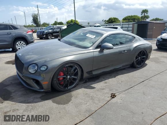 ✅ 2022 Bentley Continental GT GT V8 • VIN: SCBCG2ZG3NC093058 • Lot: 66557405. Listed on Copart with 9,760 mi. Free auction sales archive from the USA and detailed vehicle history report at DreamBid. Image 1.