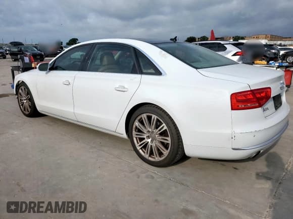 ✅ 2014 Audi A8 3.0T • VIN: WAURGAFD1EN013057 • Лот: 61161595. Опубликован ранее на Copart с пробегом 103 560 миль. Бесплатный доступ к архиву аукционных продаж из США и подробный отчёт об истории автомобиля на DreamBid. Изображение 2.