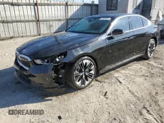 ✅ 2024 BMW 5 Series 530i • VIN: WBA43FJ06RCS54993 • Lot: 82929834. Listed on Copart with 5,101 mi. Free auction sales archive from the USA and detailed vehicle history report at DreamBid. Image 1.