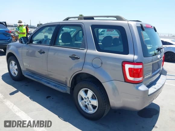 ✅ 2008 Ford Escape XLS • VIN: 1FMCU02Z68KE49322 • Lot: 42818502. Listed on IAAI with 154,099 mi. Free auction sales archive from the USA and detailed vehicle history report at DreamBid. Image 3.