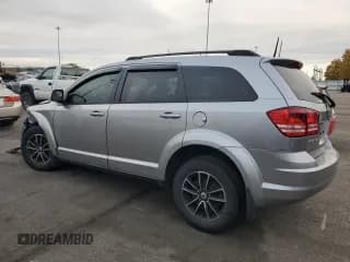 ✅ 2018 Dodge Journey SE • VIN: 3C4PDCAB6JT497452 • Lot: 87304745. Wystawiony na Copart z przebiegiem 96 497 mil. Bezpłatny archiwum sprzedaży aukcyjnych z USA i szczegółowy raport historii pojazdu na DreamBid. Zdjęcie 2.