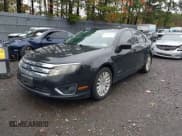 ✅ 2010 Ford Fusion Hybrid • VIN: 3FADP0L3XAR146853 • Лот: 43382761. Опубликован ранее на IAAI с пробегом 152 366 миль. Бесплатный доступ к архиву аукционных продаж из США и подробный отчёт об истории автомобиля на DreamBid. Изображение 2.