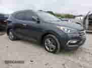 2018 Hyundai Santa Fe 2.4L z VIN 5XYZU3LB7JG543240, wystawiony jako Copart lot #89693095 z przebiegiem 121 636 mil mil oraz Czysty tytuł • Clean title. Historia ofert i sprzedaży dostępna na DreamBid. Obrazek 4.