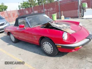 ✅ 1989 Alfa Romeo Spider Graduate • VIN: ZARBA5641K1063205 • Lot: 42721730. Wystawiony na IAAI z przebiegiem 144 559 mil. Bezpłatny archiwum sprzedaży aukcyjnych z USA i szczegółowy raport historii pojazdu na DreamBid. Zdjęcie 1.