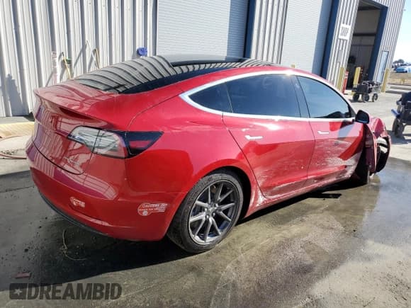 ✅ 2018 Tesla Model 3 Long Range Battery • VIN: 5YJ3E1EB2JF093444 • Лот: 71664125. Опубликован ранее на Copart с пробегом 68 218 миль. Бесплатный доступ к архиву аукционных продаж из США и подробный отчёт об истории автомобиля на DreamBid. Изображение 3.