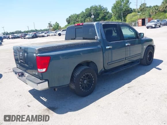 ✅ 2004 Nissan Titan XE • VIN: 1N6AA07A14N581286 • Lot: 42034620. Listed on IAAI with 200,170 mi. Free auction sales archive from the USA and detailed vehicle history report at DreamBid. Image 4.
