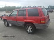 ✅ 1998 Jeep Grand Cherokee Laredo • VIN: 1J4FX58S3WC144684 • Лот: 67226694. Опубликован ранее на Copart с пробегом 106 602 миль. Бесплатный доступ к архиву аукционных продаж из США и подробный отчёт об истории автомобиля на DreamBid. Изображение 2.