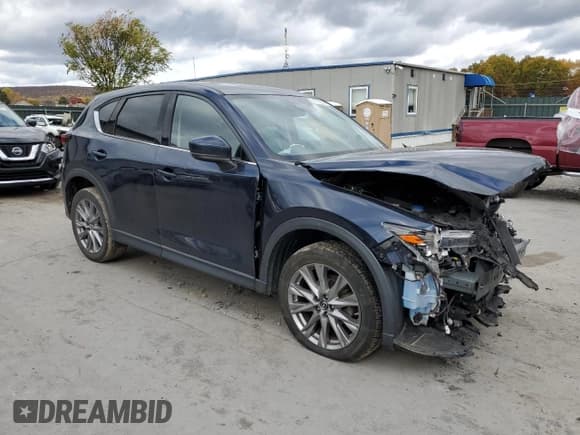 ✅ 2020 Mazda CX-5 Grand Touring • VIN: JM3KFBDM0L1798148 • Lot: 89519645. Listed on Copart with 74,535 mi. Free auction sales archive from the USA and detailed vehicle history report at DreamBid. Image 4.