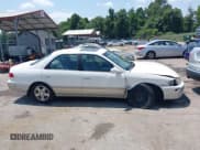 ✅ 2001 Toyota Camry CE • VIN: JT2BG22KX10546426 • Lot: 42812021. Listed on IAAI with 184,122 mi. Free auction sales archive from the USA and detailed vehicle history report at DreamBid. Image 14.