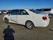 ✅ 2006 Toyota Camry LE • VIN: 4T1BE32K76U706437 • Lot: 93868095. Listed on Copart with 153,643 mi. Free auction sales archive from the USA and detailed vehicle history report at DreamBid. Image 2.