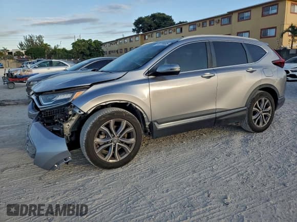 ✅ 2020 Honda CR-V Touring • VIN: 7FARW1H92LE017925 • Lot: 93729505. Listed on Copart with 58,772 mi. Free auction sales archive from the USA and detailed vehicle history report at DreamBid. Image 1.