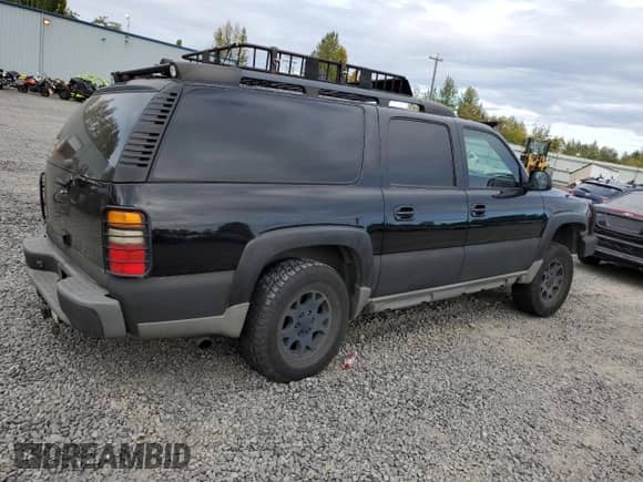 2005 Chevrolet Suburban LS with VIN 3GNFK16Z75G256551, listed as a Copart auction lot 76172014 with 229,260 mi miles and Salvage title. Bid and sale history available at DreamBid. Image 3.