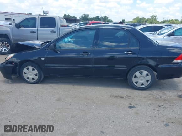 ✅ 2004 Mitsubishi Lancer ES • VIN: JA3AJ26E04U023128 • Lot: 42804725. Listed on IAAI with 167,183 mi. Free auction sales archive from the USA and detailed vehicle history report at DreamBid. Image 14.