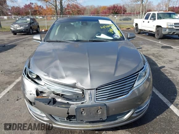 ✅ 2015 Lincoln MKZ Hybrid • VIN: 3LN6L2LU8FR619154 • Lot: 43663221. Wystawiony na IAAI z przebiegiem 291 930 mil. Bezpłatny archiwum sprzedaży aukcyjnych z USA i szczegółowy raport historii pojazdu na DreamBid. Zdjęcie 12.